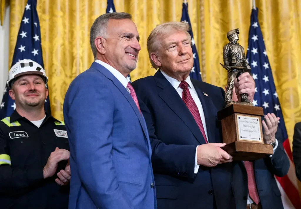 Peabody Energy CEO Jim Grech presented Donald Trump a trophy for his support for the coal industry on February 12. (Photo: White House)