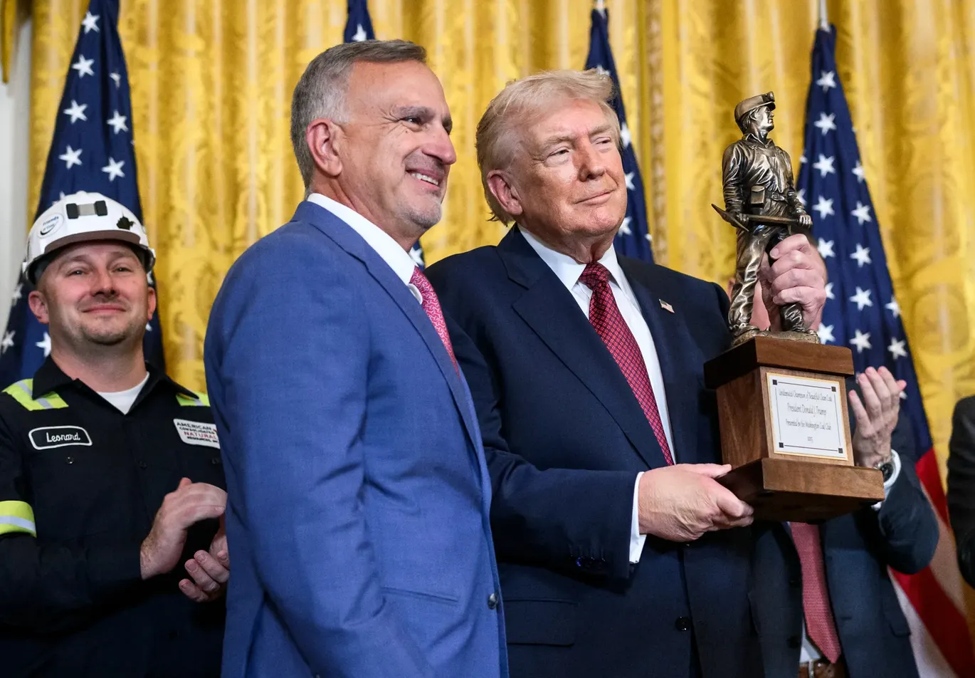 Peabody Energy CEO Jim Grech presented Donald Trump a trophy for his support for the coal industry on February 12. (Photo: White House)